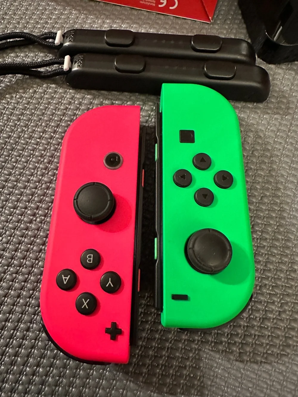 2 Nintendo switch Joy-Con Controllers 2 Racing steering wheels & 1 charging dock
